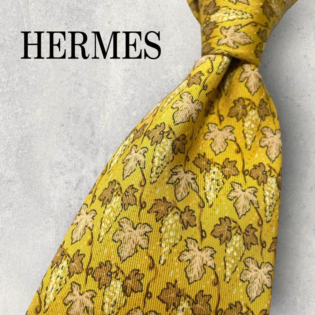Hermes(エルメス)の美品 HERMES エルメス ぶどう 葡萄 植物柄 ボーダー ネクタイ イエロー メンズのファッション小物(ネクタイ)の商品写真