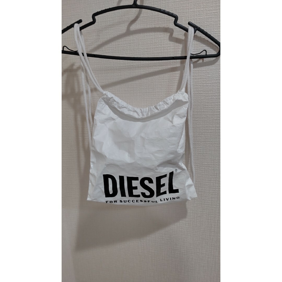 DIESEL(ディーゼル)の【最終セール中】 DIESEL ディーゼル ナップサック ホワイト ユニセックス レディースのバッグ(リュック/バックパック)の商品写真