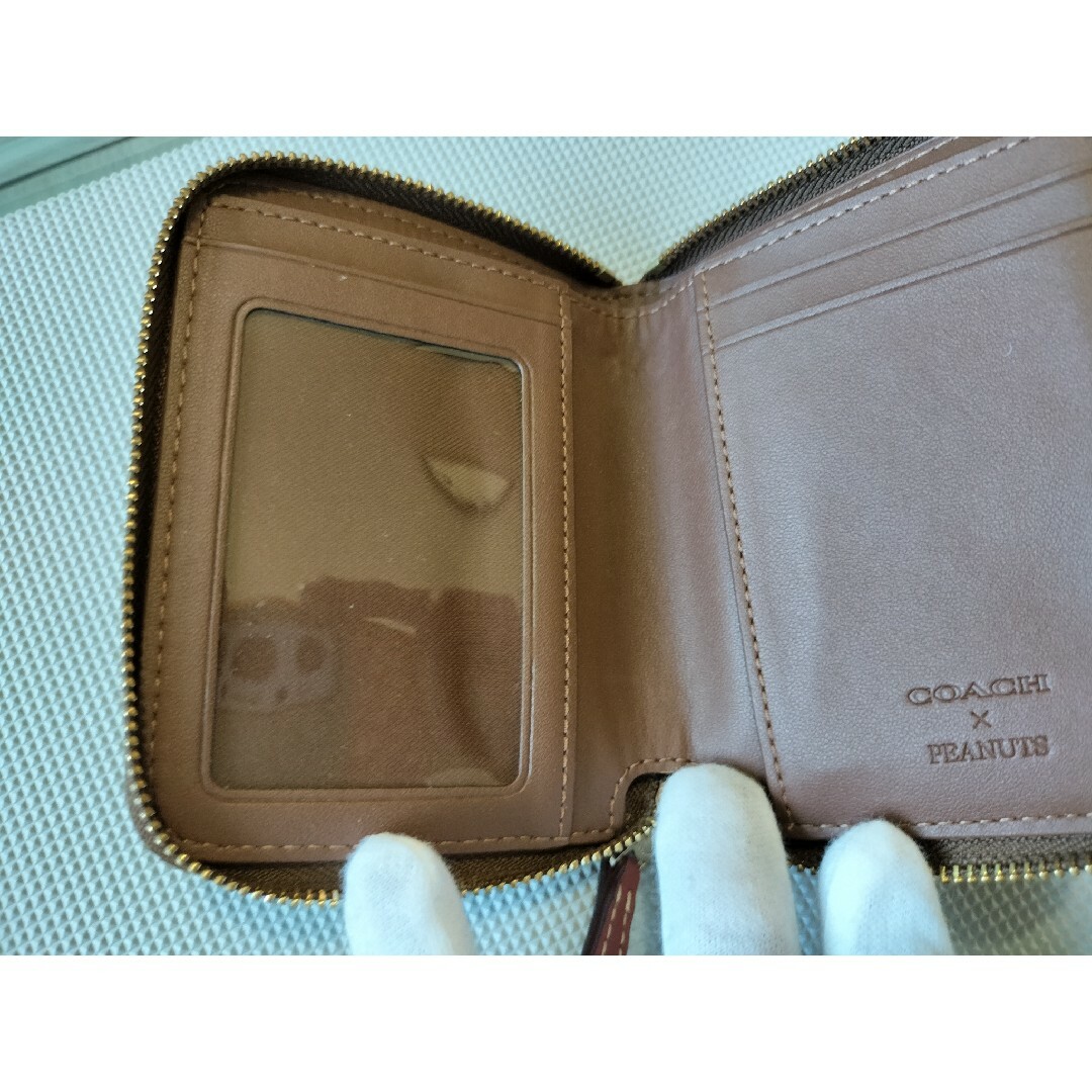 COACH(コーチ)のコーチ 財布 スヌーピー COACH シグネチャー ピーナッツ コラボ スヌーピ レディースのファッション小物(財布)の商品写真