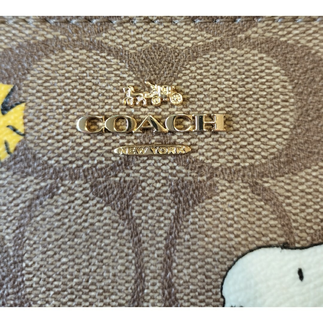 COACH(コーチ)のコーチ 財布 スヌーピー COACH シグネチャー ピーナッツ コラボ スヌーピ レディースのファッション小物(財布)の商品写真