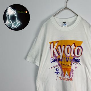 アディダス(adidas)の【アディダス　半袖Tシャツ　ヴィンテージＴ　90’s　アイボリー　古着】(Tシャツ/カットソー(半袖/袖なし))