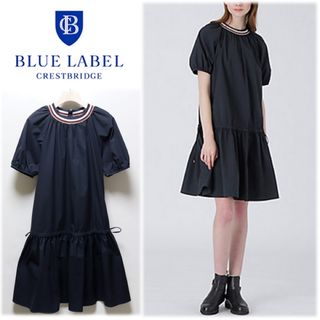 ブルーレーベルクレストブリッジ(BLUE LABEL CRESTBRIDGE)の《ブルーレーベル》新品 はっ水 4Wayストレッチレインドレス ワンピース 38(ひざ丈ワンピース)