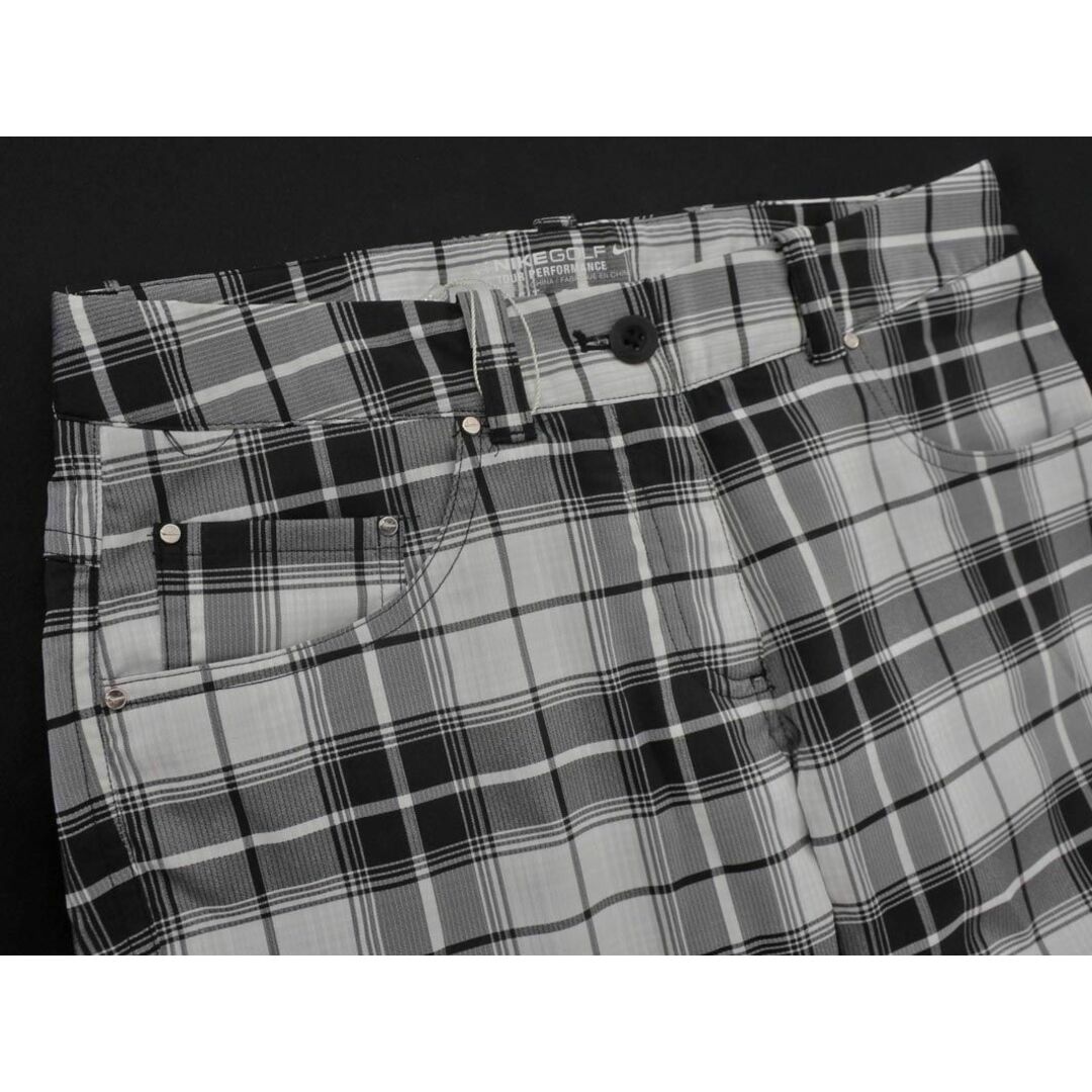 NIKE(ナイキ)の新品 NIKE ナイキ ゴルフ チェック ハーフ パンツ size2/白ｘ黒 ■◆ レディース レディースのパンツ(ハーフパンツ)の商品写真
