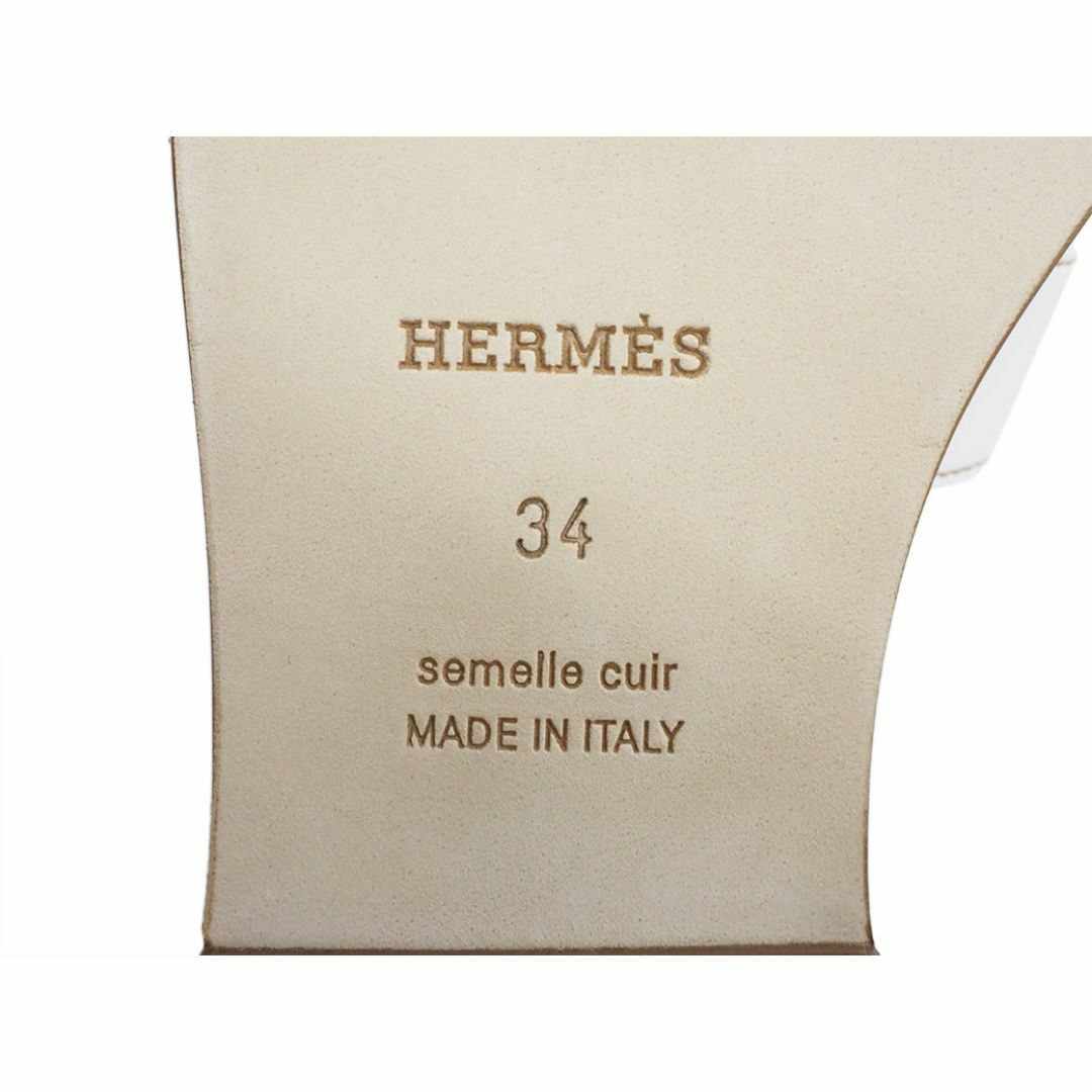 Hermes(エルメス)のエルメス オラン ホワイト H021056Z レディース レザー サンダル 34(21.5cm) ミュール Hロゴ フラット ぺたんこ 2022年12月購入 HERMES【未使用品】 レディースの靴/シューズ(サンダル)の商品写真