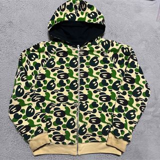 アベイシングエイプ(A BATHING APE)のAPE BAPE KAWS BABY MILO CAMO 迷彩　パーカー　STA(パーカー)