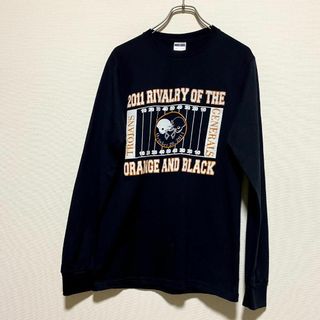 ジャージーズ(JERZEES)のアメリカ古着　NCAA　アメフト　カレッジプリント　長袖　Ｔシャツ　ロンT(Tシャツ/カットソー(七分/長袖))