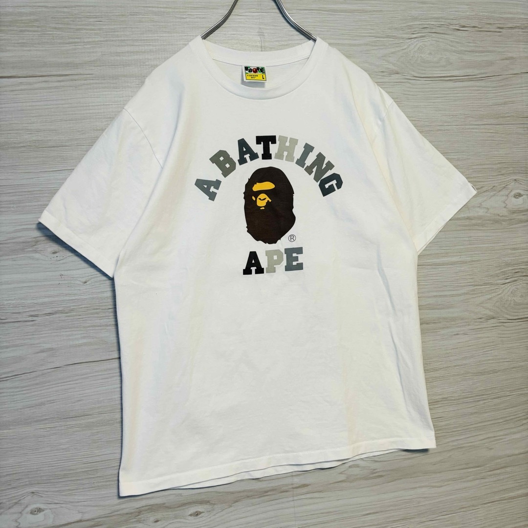 A BATHING APE(アベイシングエイプ)の【人気デザイン】アベイシングエイプ　Tシャツ　Lサイズ　アーチロゴ　センターロゴ メンズのトップス(Tシャツ/カットソー(半袖/袖なし))の商品写真