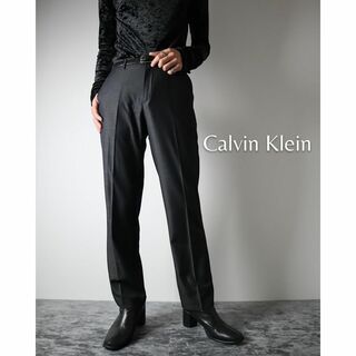 カルバンクライン(Calvin Klein)のカルバンクライン ワイドストレート ノータック スラックス 光沢 グレー W30(スラックス)