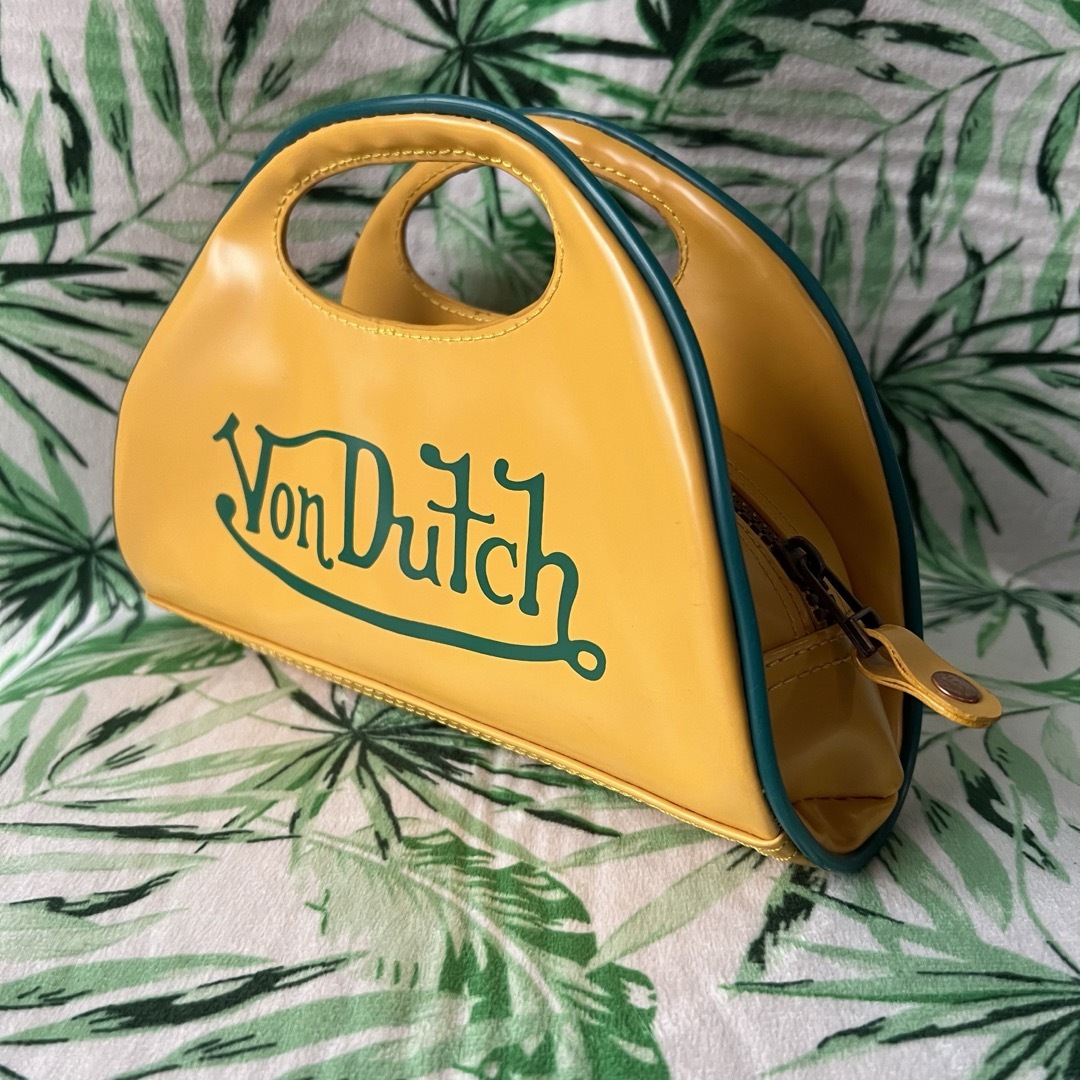 Von Dutch(ボンダッチ)の美品　黄色✖️緑色　ボンダッチ　Von Dutch  ミニバック　クラッチバック レディースのバッグ(クラッチバッグ)の商品写真