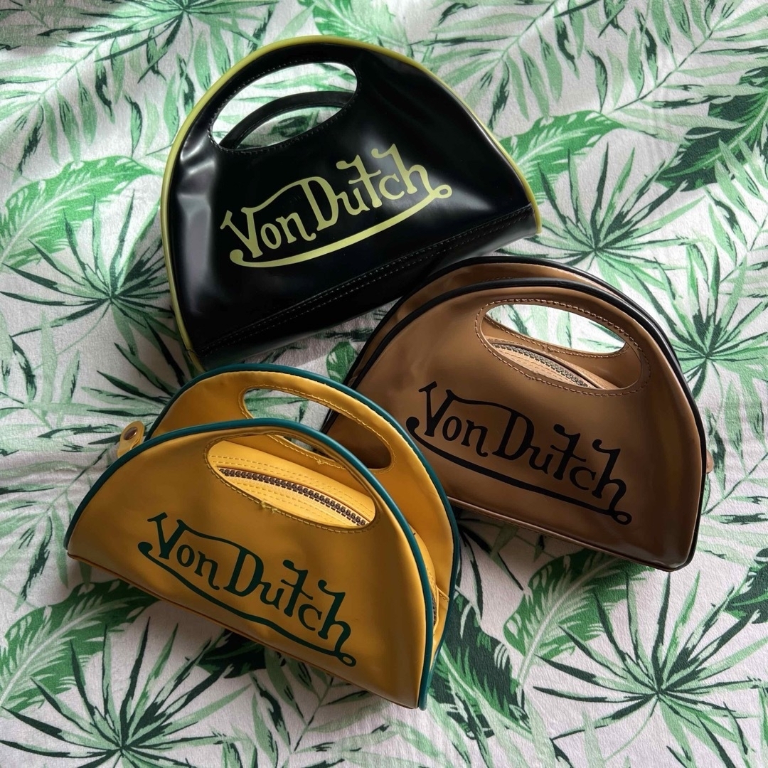 Von Dutch(ボンダッチ)の新品未使用　黒色×黄緑色　ボンダッチ　Von Dutch  ミニ　クラッチバック レディースのバッグ(クラッチバッグ)の商品写真