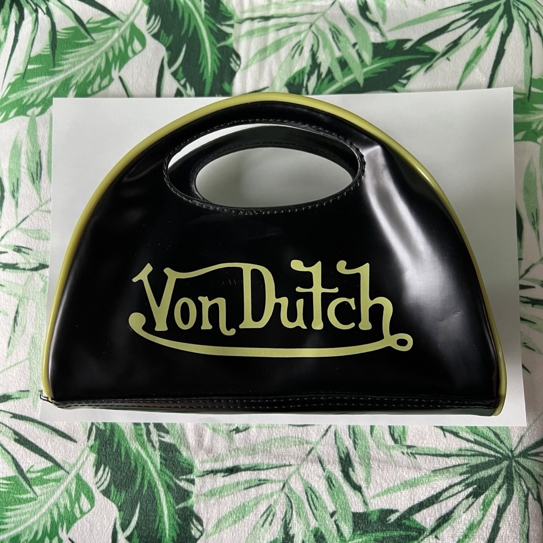 Von Dutch(ボンダッチ)の新品未使用　黒色×黄緑色　ボンダッチ　Von Dutch  ミニ　クラッチバック レディースのバッグ(クラッチバッグ)の商品写真