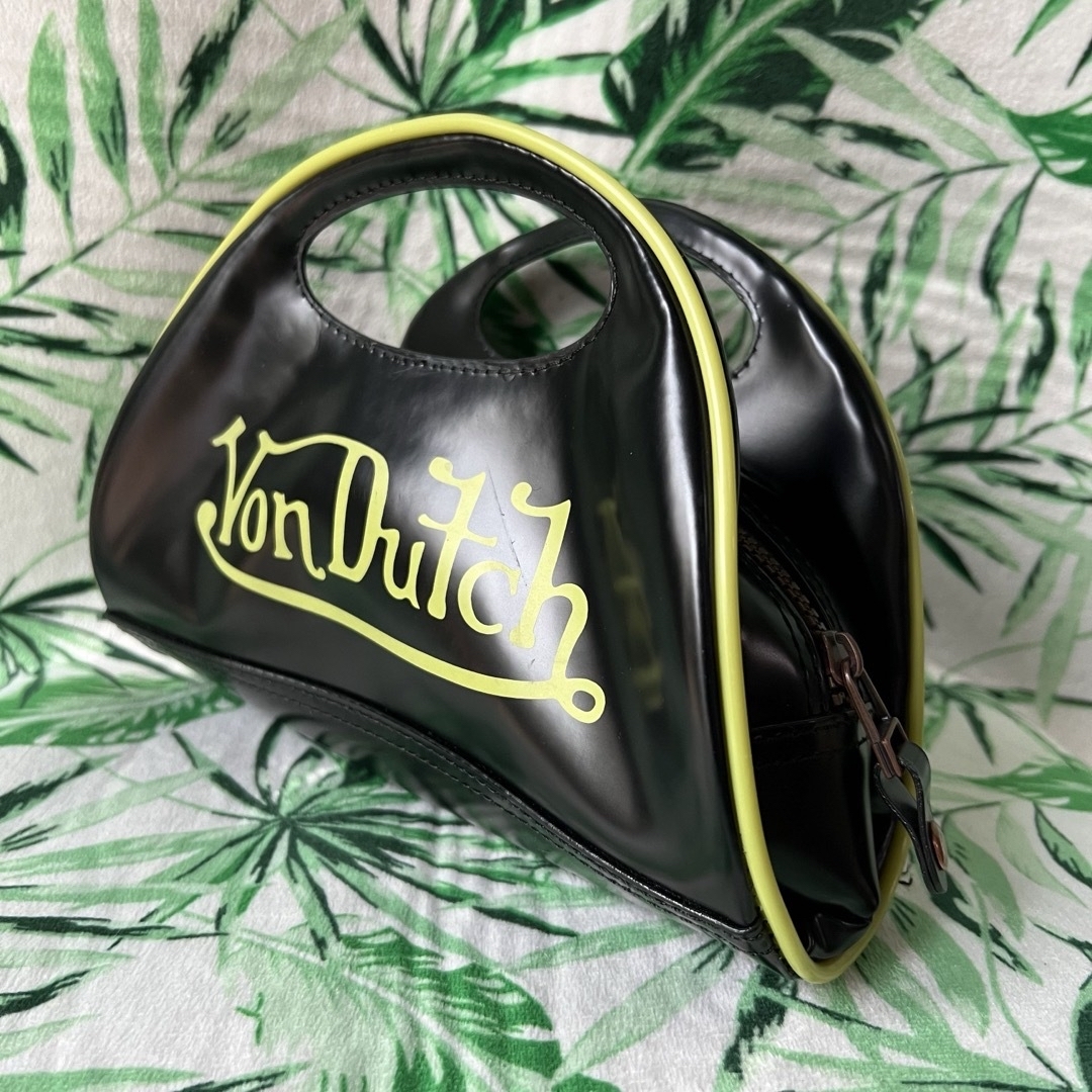 Von Dutch(ボンダッチ)の新品未使用　黒色×黄緑色　ボンダッチ　Von Dutch  ミニ　クラッチバック レディースのバッグ(クラッチバッグ)の商品写真