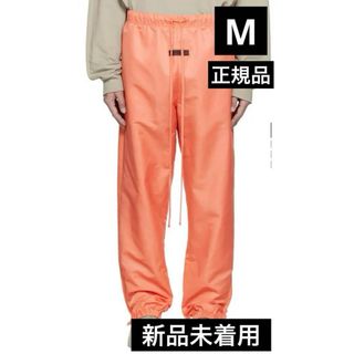 フィアオブゴッド(FEAR OF GOD)のESSENTIALS エッセンシャルズ ピンク ドローストリング トラックパンツ(ワークパンツ/カーゴパンツ)