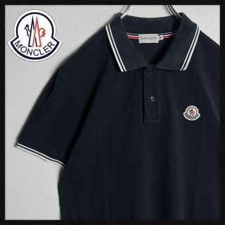 モンクレール(MONCLER)の【即完売モデル】モンクレール　ロゴワッペン　ポロシャツ　黒　ブラック　M(ポロシャツ)