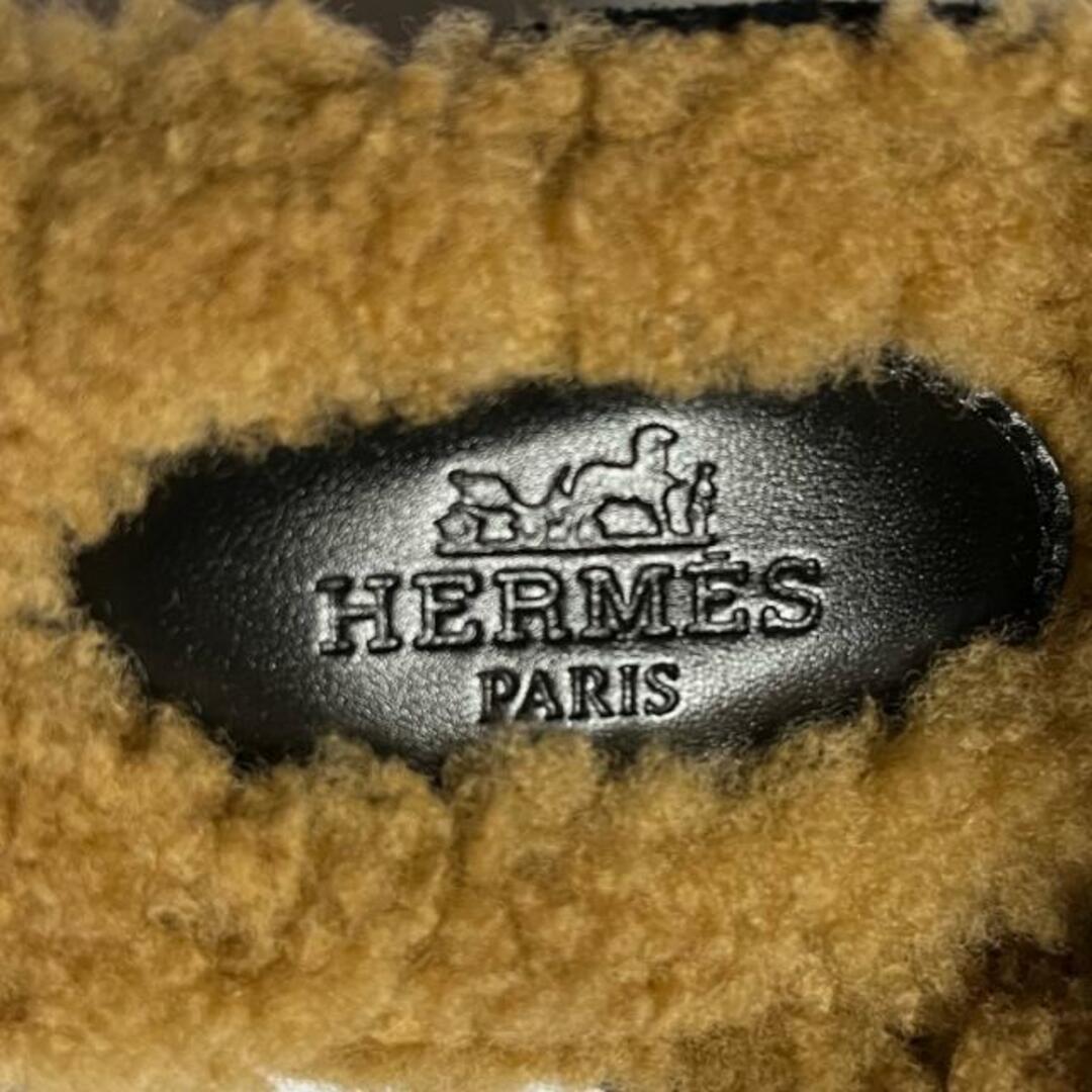 Hermes(エルメス)のHERMES(エルメス) ミュール 36 1/2 レディース美品  フローラ60 黒 シルバー金具/H金具 ムートン レディースの靴/シューズ(ミュール)の商品写真