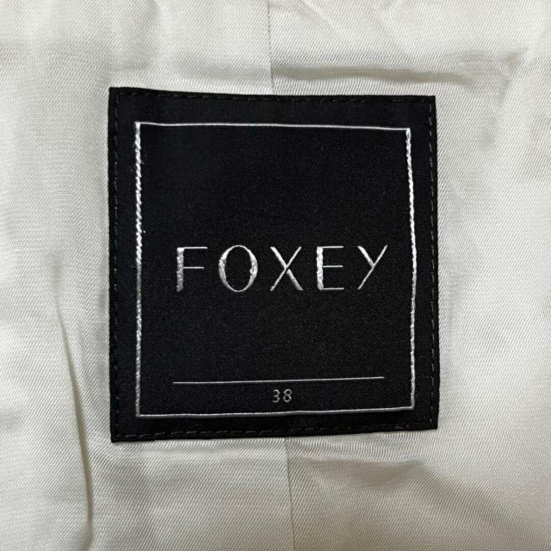 FOXEY(フォクシー)のFOXEY(フォクシー) ジャケット サイズ38 M レディース - アイボリー 長袖/ニット/ショート丈/秋/冬 レディースのジャケット/アウター(その他)の商品写真