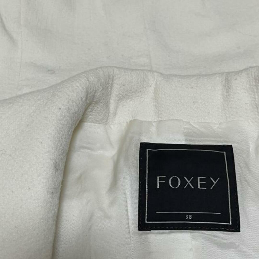 FOXEY(フォクシー)のFOXEY(フォクシー) ジャケット サイズ38 M レディース - アイボリー 長袖/ニット/ショート丈/秋/冬 レディースのジャケット/アウター(その他)の商品写真