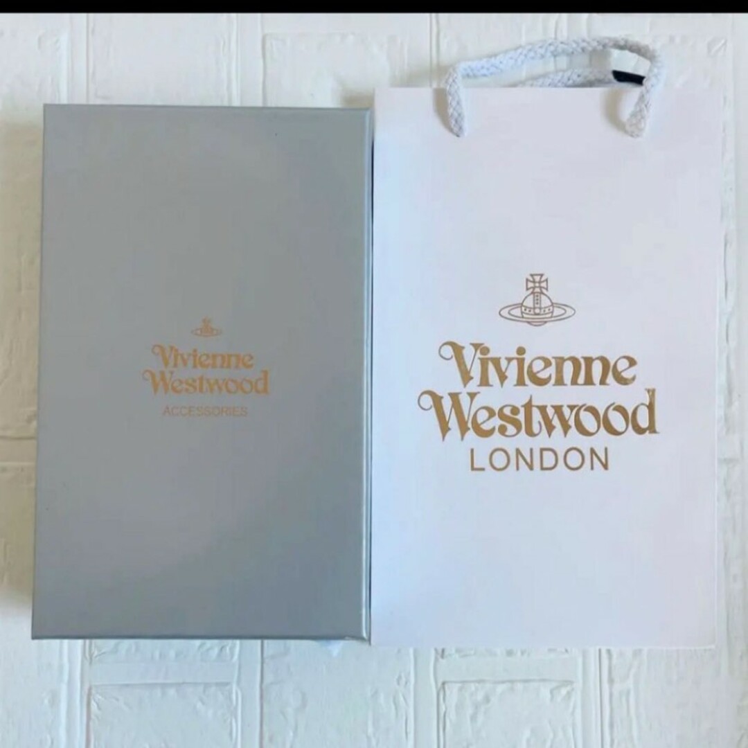 Vivienne Westwood(ヴィヴィアンウエストウッド)の【新品未使用】Vivienne Westwood 長財布 オレンジ ブルー メンズのファッション小物(長財布)の商品写真