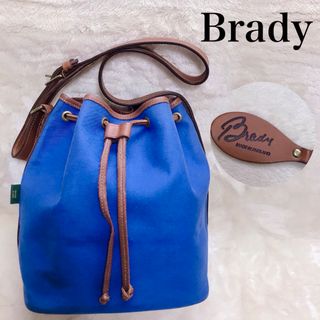 ブレディ(Brady)の美品 Brady 巾着 レザー ショルダーバッグ タッセル 斜め掛 クロスボディ(ショルダーバッグ)