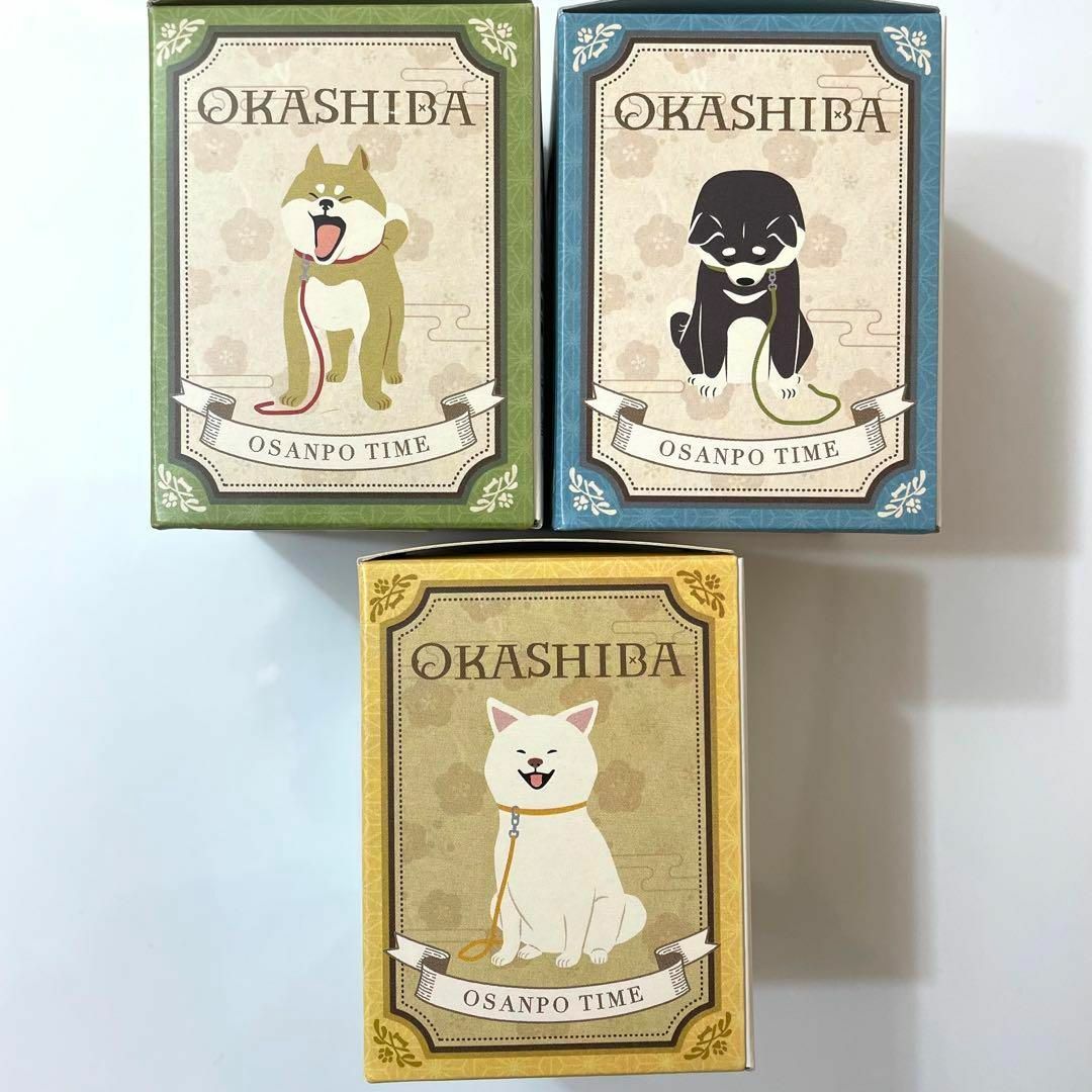 おかしば ミニ円筒缶 3個 専用袋付き OKASHIBA 柴犬 シバ犬 豆柴 食品/飲料/酒の食品(菓子/デザート)の商品写真