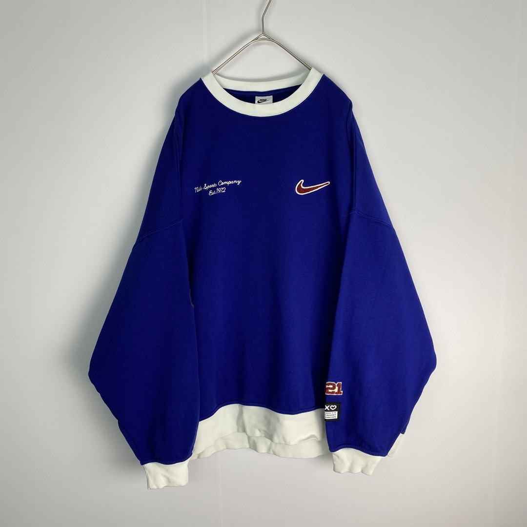 NIKE(ナイキ)の【ナイキ　スウェット　ワッペン　ロゴ　青　白　古着】 メンズのトップス(スウェット)の商品写真