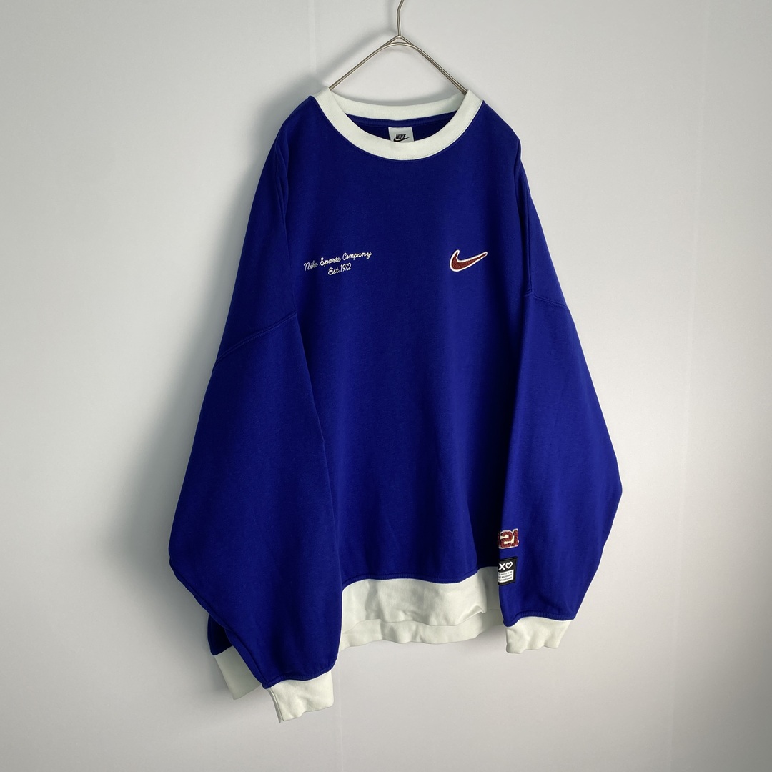 NIKE(ナイキ)の【ナイキ　スウェット　ワッペン　ロゴ　青　白　古着】 メンズのトップス(スウェット)の商品写真