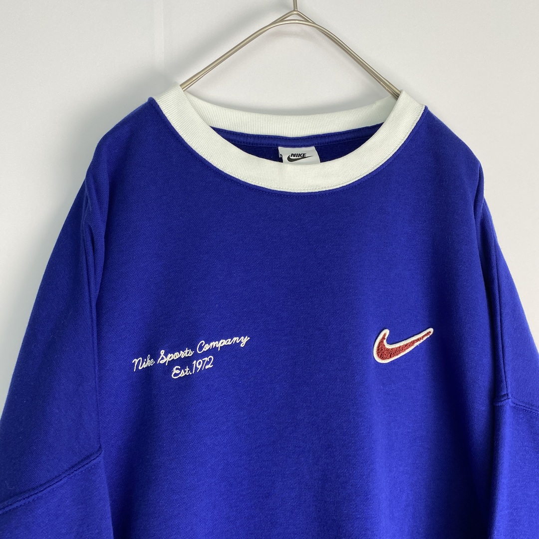 NIKE(ナイキ)の【ナイキ　スウェット　ワッペン　ロゴ　青　白　古着】 メンズのトップス(スウェット)の商品写真