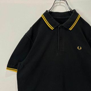 フレッドペリー(FRED PERRY)のフレッドペリー　ポロシャツ　ワンポイントロゴ　半袖シャツ　ブラック　古着　UK(ポロシャツ)