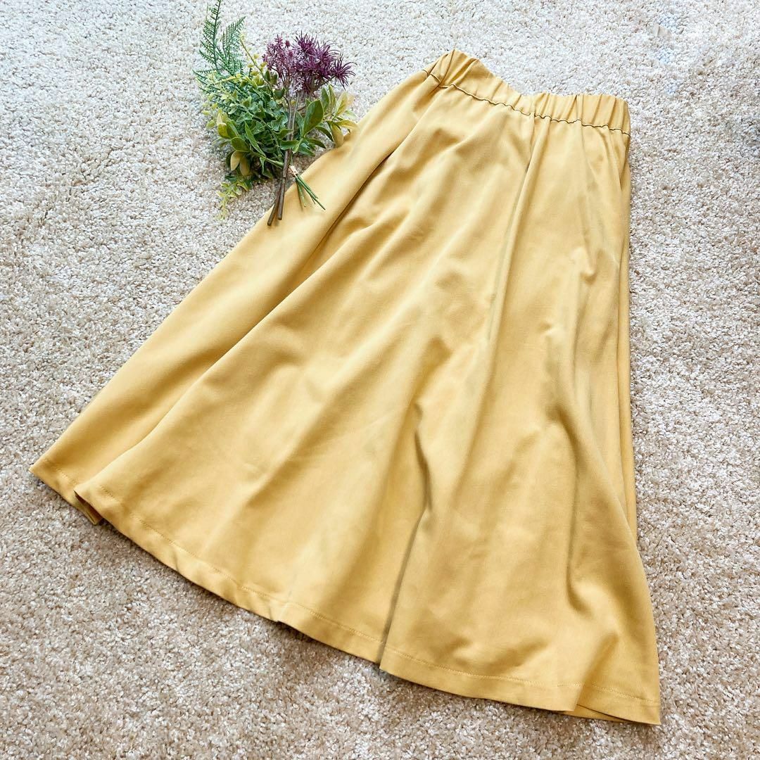 RayCassin(レイカズン)のRAY CASSIN レイカズン 春 イエロー フレア 巻き スカート レディースのスカート(ひざ丈スカート)の商品写真