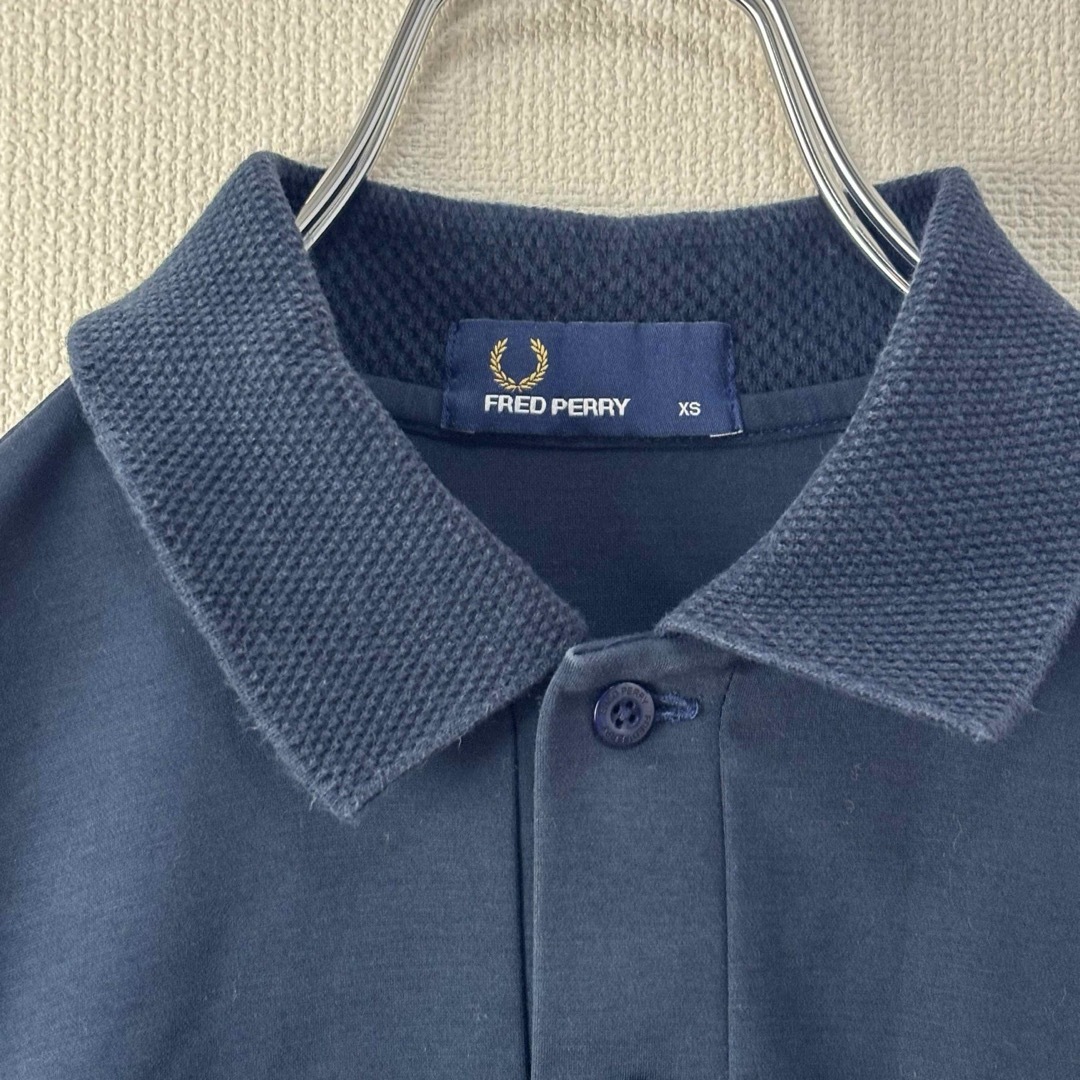 FRED PERRY(フレッドペリー)の人気　フレッドペリー　ポロシャツ　ネイビー　XS 古着 メンズのトップス(ポロシャツ)の商品写真