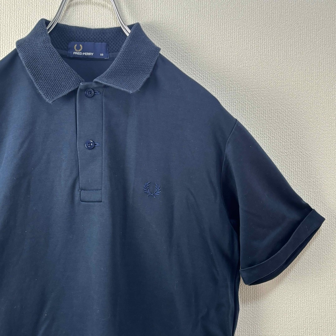 FRED PERRY(フレッドペリー)の人気　フレッドペリー　ポロシャツ　ネイビー　XS 古着 メンズのトップス(ポロシャツ)の商品写真