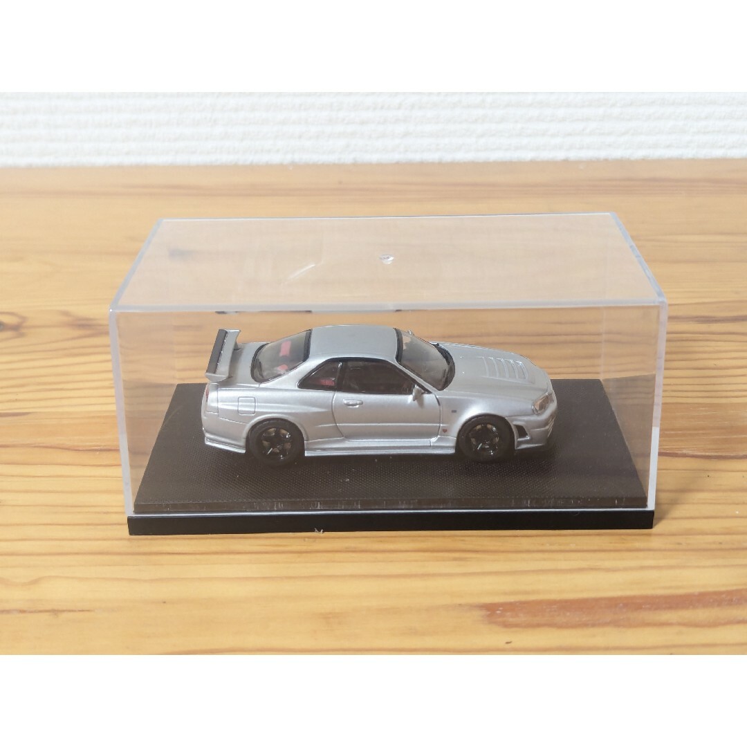 1/43 ニッサン スカイラインGT-R R34 VスペックII シルバー ミ… エンタメ/ホビーのおもちゃ/ぬいぐるみ(ミニカー)の商品写真