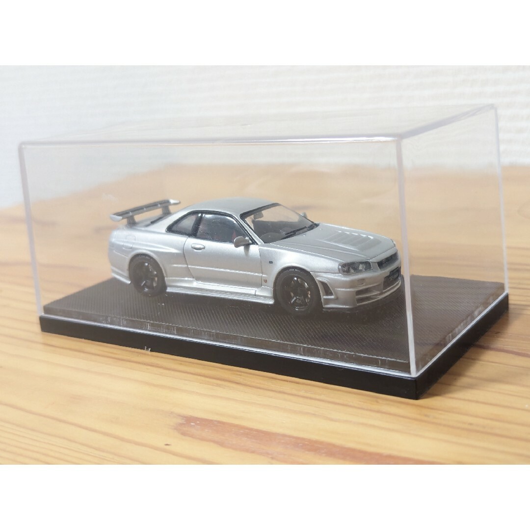 1/43 ニッサン スカイラインGT-R R34 VスペックII シルバー ミ… エンタメ/ホビーのおもちゃ/ぬいぐるみ(ミニカー)の商品写真