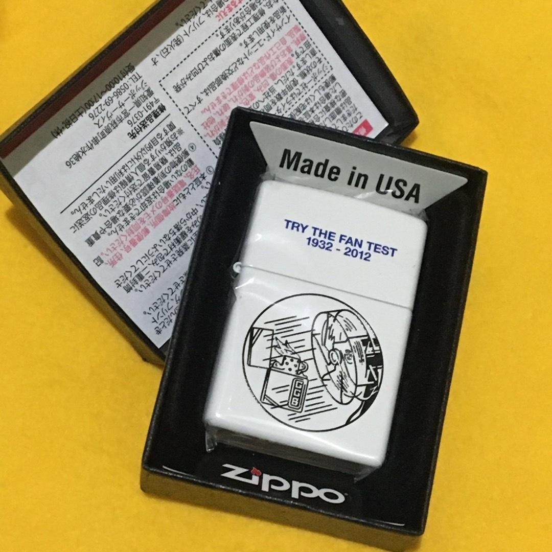 ZIPPO(ジッポー)のZIPPO ホワイト耐風テスト レトロ広告図 ジッポー 未使用 メンズのファッション小物(タバコグッズ)の商品写真