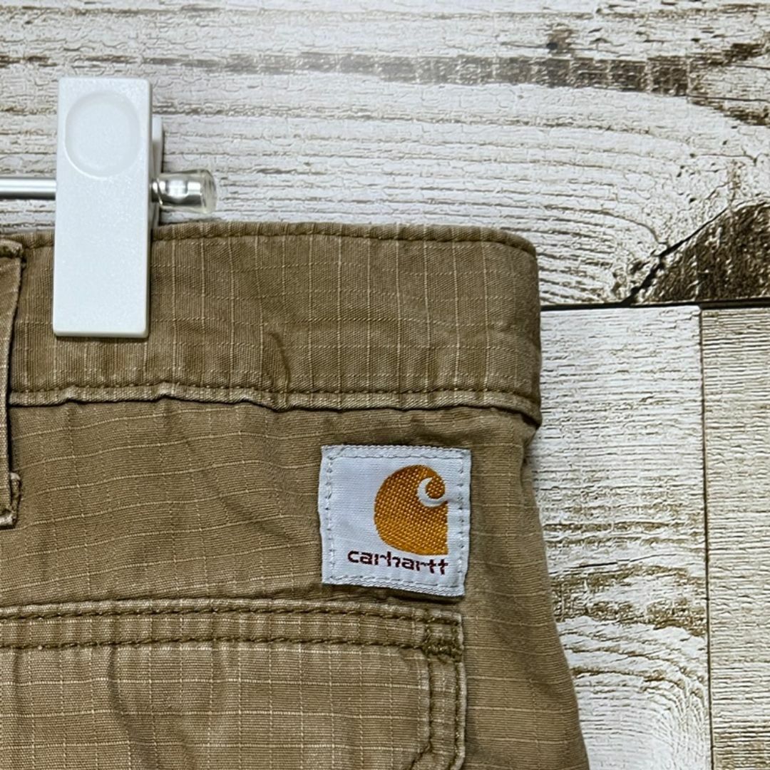 carhartt(カーハート)の【116】USA規格カーハートダック地ワーク系パンツロゴ付き メンズのパンツ(ワークパンツ/カーゴパンツ)の商品写真