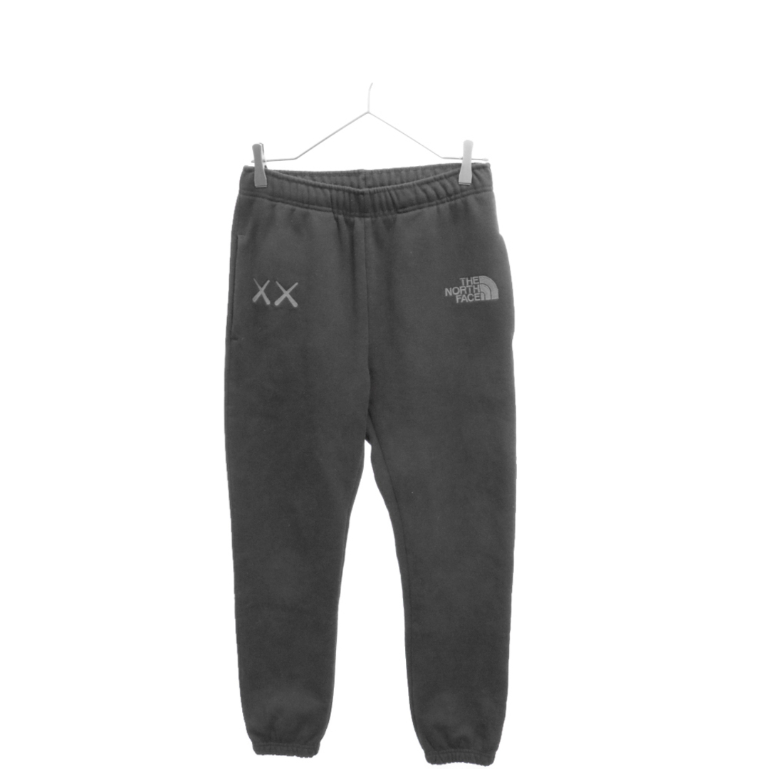 THE NORTH FACE(ザノースフェイス)のTHE NORTH FACE ザノースフェイス ×KAWS XX SWEAT PANT XXスウェットパンツ ブラック NF0A7WLKVA6 メンズのパンツ(その他)の商品写真