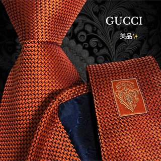 グッチ(Gucci)のGUCCI グッチ オレンジ系 光沢感 モザイク柄 イタリア製(ネクタイ)
