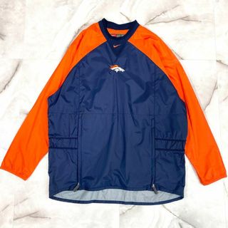 ナイキ(NIKE)の90'sナイキ NFLプルオーバーナイロンジャケット センターロゴ　紺×橙　L(ナイロンジャケット)