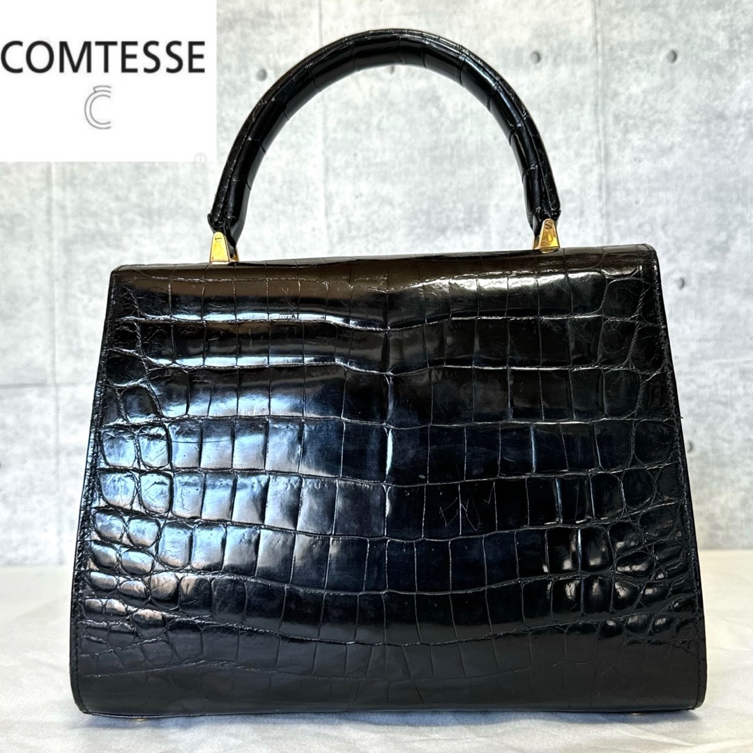 COMTESSE(コンテス)の【良品】COMTESSE シャイニングクロコダイル ブラック 本革 ハンドバッグ レディースのバッグ(ハンドバッグ)の商品写真