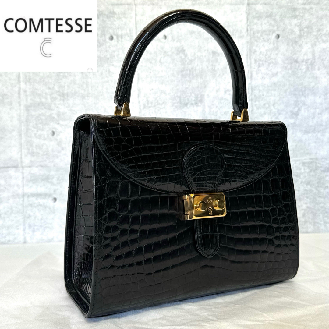 COMTESSE(コンテス)の【良品】COMTESSE シャイニングクロコダイル ブラック 本革 ハンドバッグ レディースのバッグ(ハンドバッグ)の商品写真