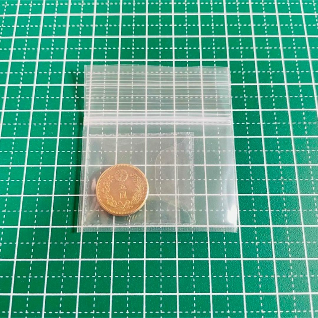 新5圓金貨 昭和5年　レプリカコイン　新5円 エンタメ/ホビーの美術品/アンティーク(貨幣)の商品写真