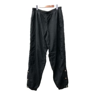 ナイキ(NIKE)の90年代 NIKE ナイキ ナイロン サイドスナップ トラックパンツ スポーツ ブラック (メンズ L) 中古 古着 Q2416(その他)