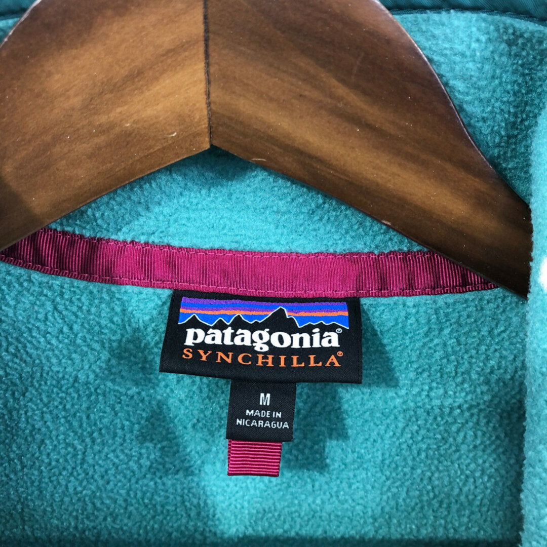 patagonia(パタゴニア)のpatagonia パタゴニア SYNCHILLA シンチラ スナップT フリースジャケット アウトドア エメラルドグリーン (レディース M) 中古 古着 Q2489 レディースのジャケット/アウター(その他)の商品写真