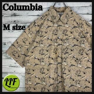 コロンビア(Columbia)のコロンビア ロゴタグ 総柄 魚 フィッシング 半袖 BDシャツ ベージュ M(シャツ)