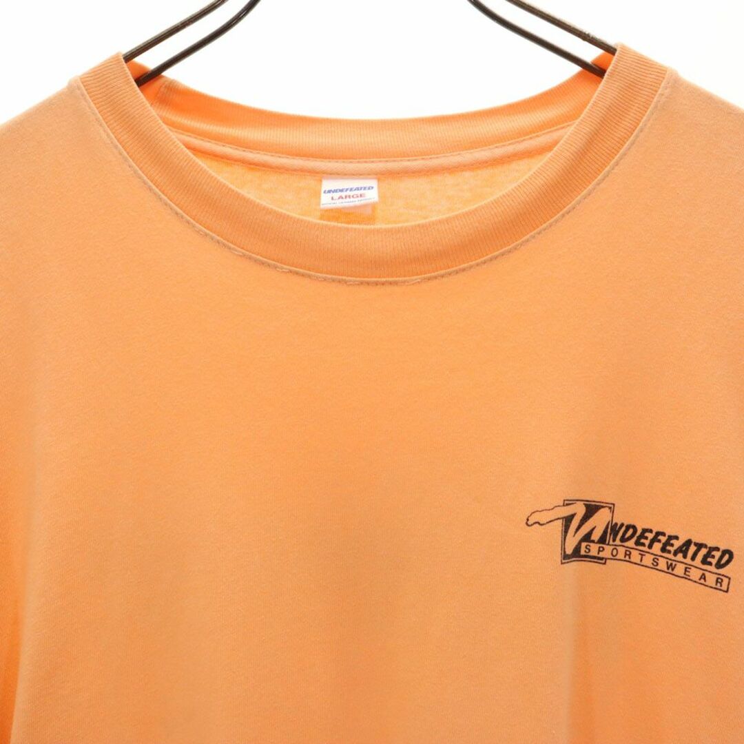 アンディーフィーテッド USA製 バックプリント 半袖 Tシャツ L オレンジ UNDEFEATED メンズ 古着 【240329】 メール便可 メンズのトップス(Tシャツ/カットソー(半袖/袖なし))の商品写真
