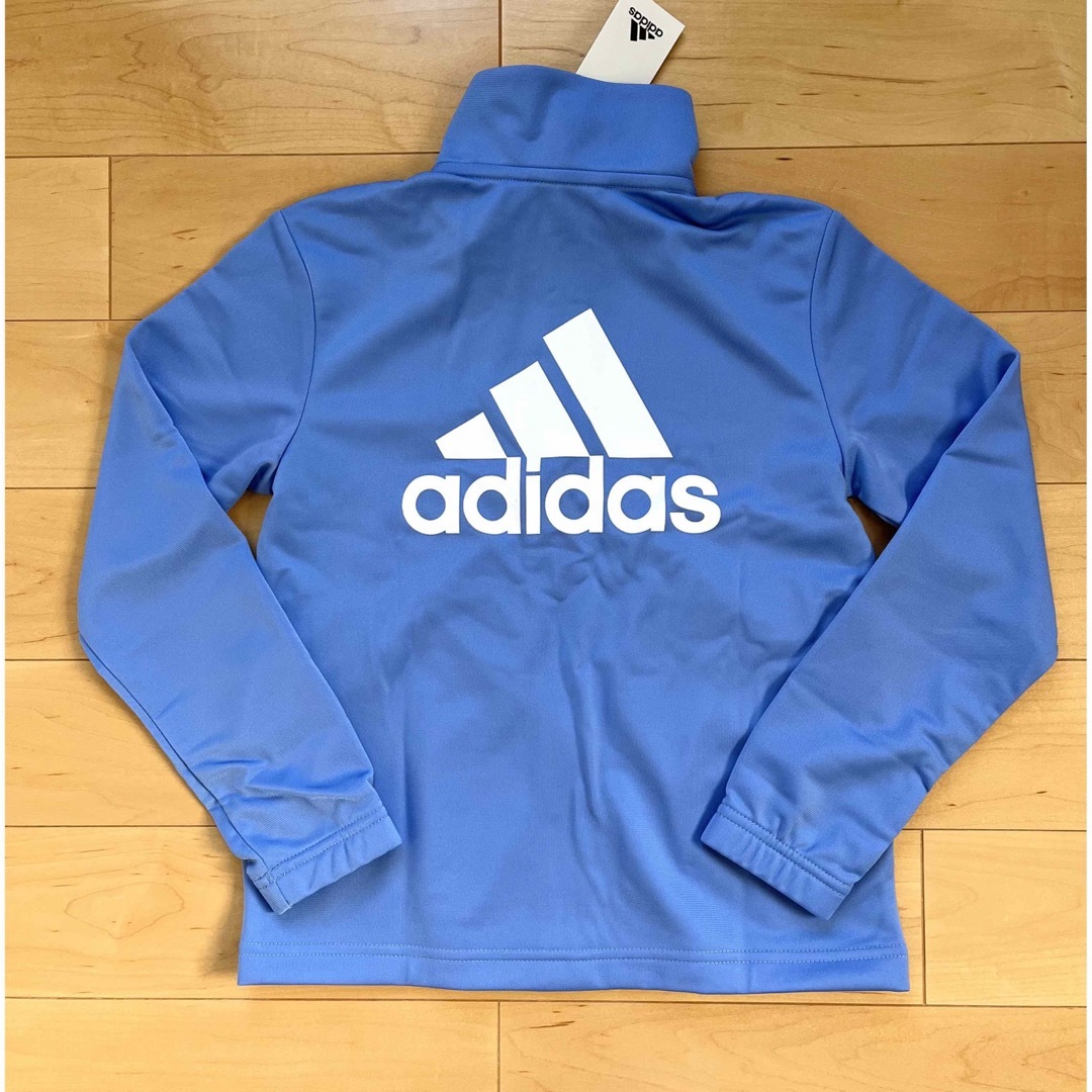 adidas(アディダス)のadidas アディダス 水色 ジャージ キッズ 130cm ☆新品未使用 キッズ/ベビー/マタニティのキッズ服女の子用(90cm~)(ジャケット/上着)の商品写真