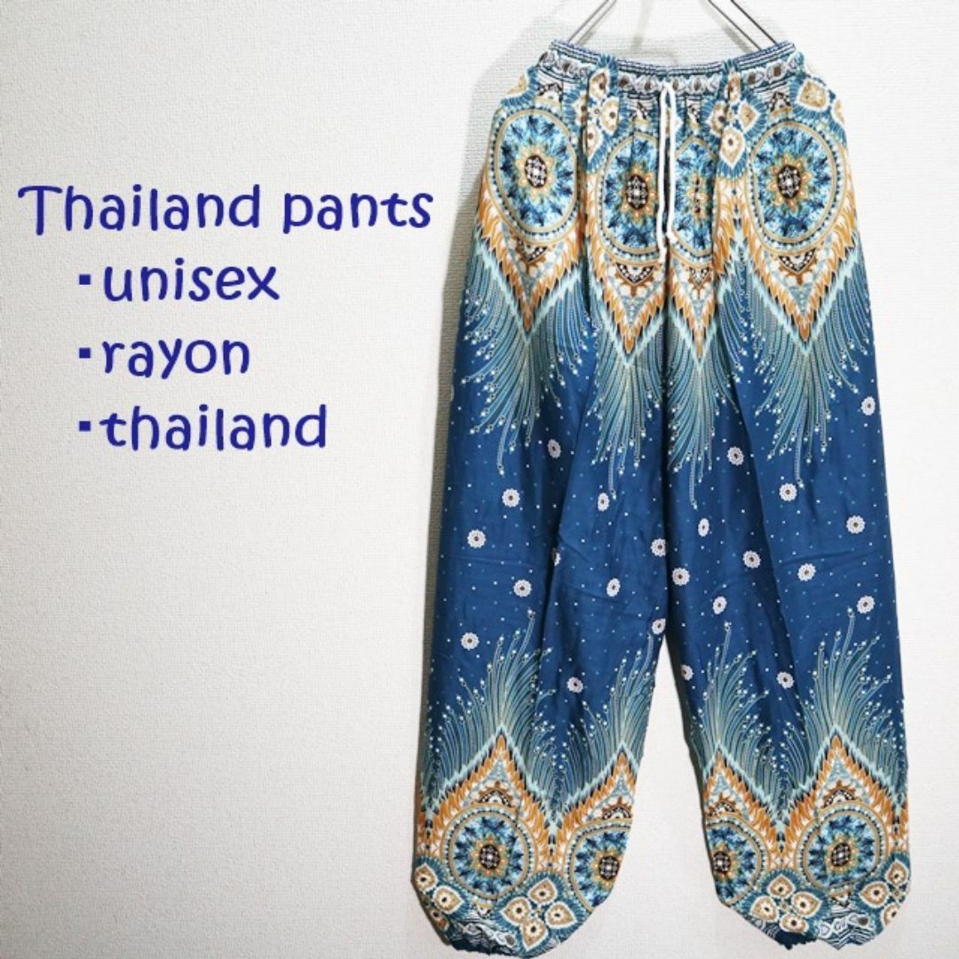【新品】タイパンツ　大きな羽根モチーフ柄と花とドット　藍色系 メンズのパンツ(サルエルパンツ)の商品写真