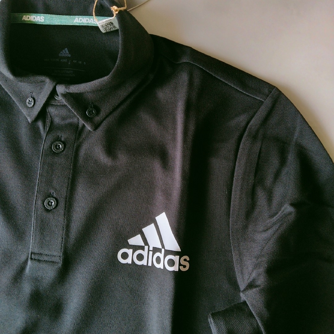 adidas(アディダス)の新品 黒 XL アディダス ゴルフ 長袖 ポロシャツ メンズ ゴルフウェア スポーツ/アウトドアのゴルフ(ウエア)の商品写真