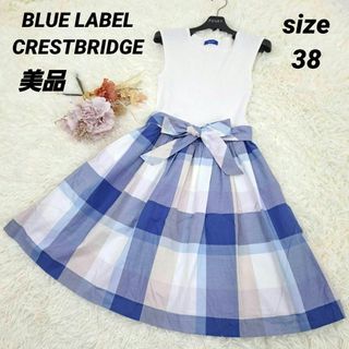 ブルーレーベルクレストブリッジ(BLUE LABEL CRESTBRIDGE)の【美品】ブルーレーベルクレストブリッジ　ドッキングワンピース　リボン付　38(ひざ丈ワンピース)