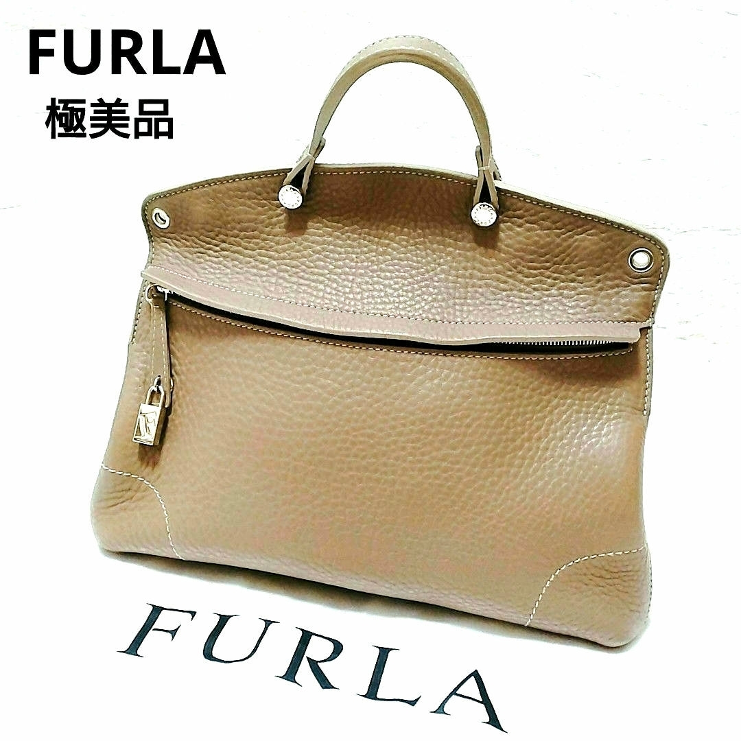 Furla(フルラ)の【極美品】FURLA フルラ ハンドバッグ　レザー　ブラウン系　保存袋付　南京錠 レディースのバッグ(ハンドバッグ)の商品写真